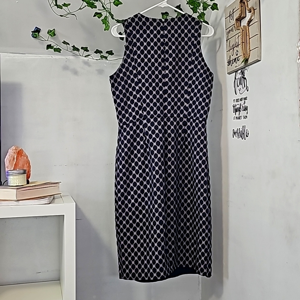 A maxi dress. Color navy blue and  cream.